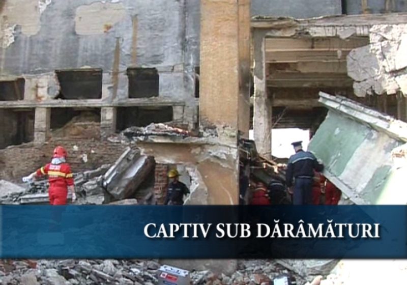 Captiv sub dărămături Captiv sub dărămături