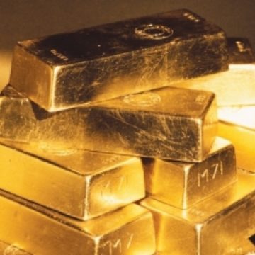 Preţul aurului a atins un nou record istoric. Bursele din Asia au scăzut luni cu 1%