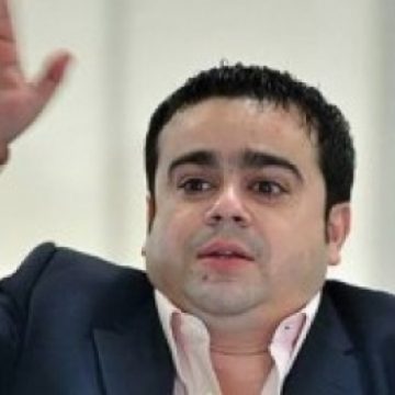 Adi Minune audiat pentru furtul unei sticle cu şampanie