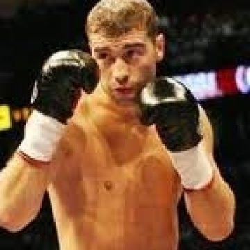 Box: Licitaţia pentru mănuşile lui Lucian Bute a ajuns la 8.100 euro