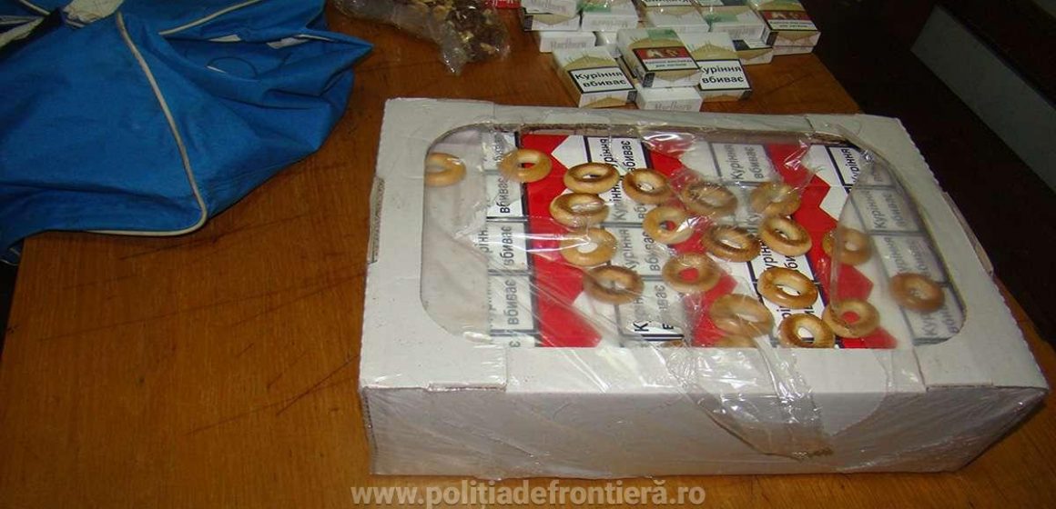 Contrabandă cu împușcături și țigări ascunse în cutii de prăjituri Contrabandă cu împușcături și țigări ascunse în cutii de prăjituri