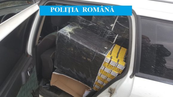 Contrabandist reţinut după o urmărire în trafic. 165.000 de ţigarete confiscate