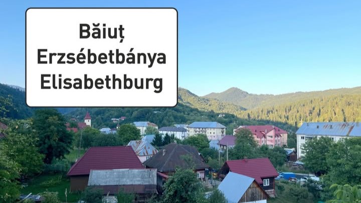 BĂIUȚ: Indicatoare cu denumirea localității în trei limbi BĂIUȚ: Indicatoare cu denumirea localității în trei limbi